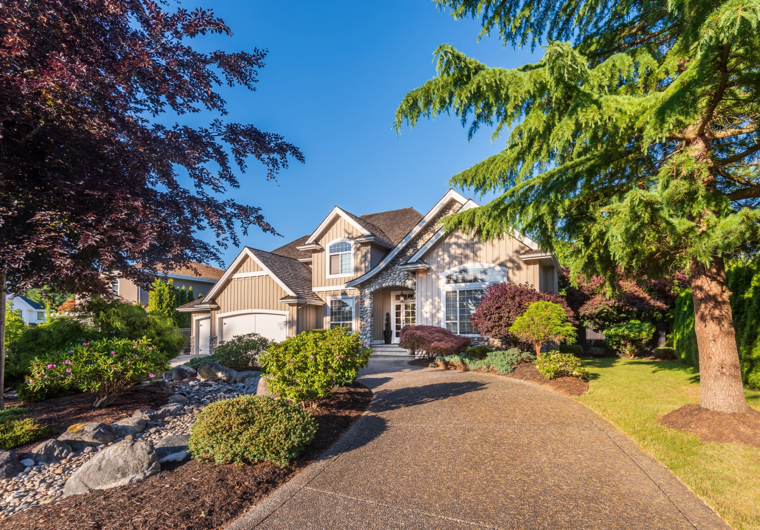 Beautiful exterior of luxury home landscaping in Connecticut
